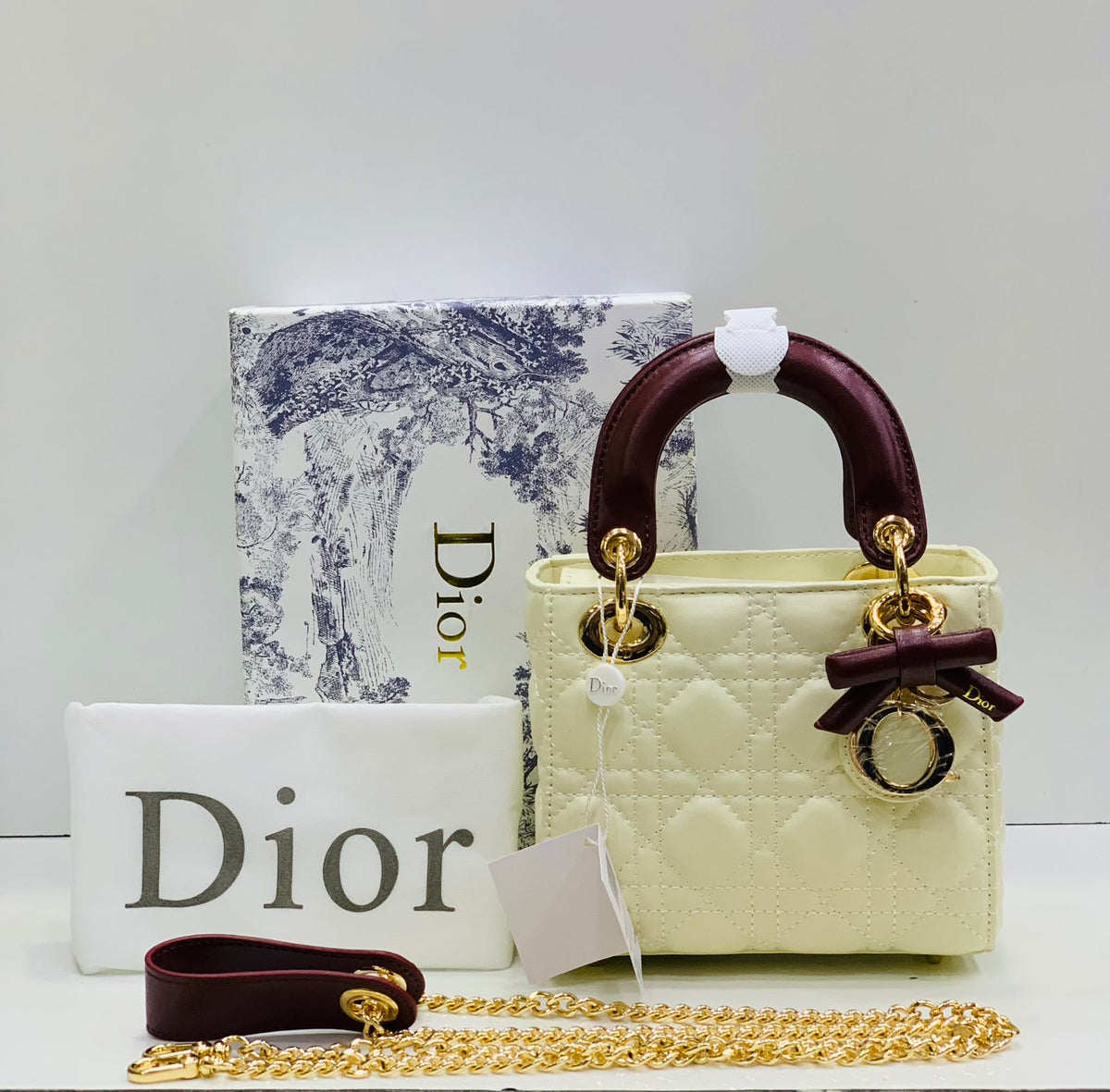 Cannage Quilted Mini Handbag with White Bow Charm