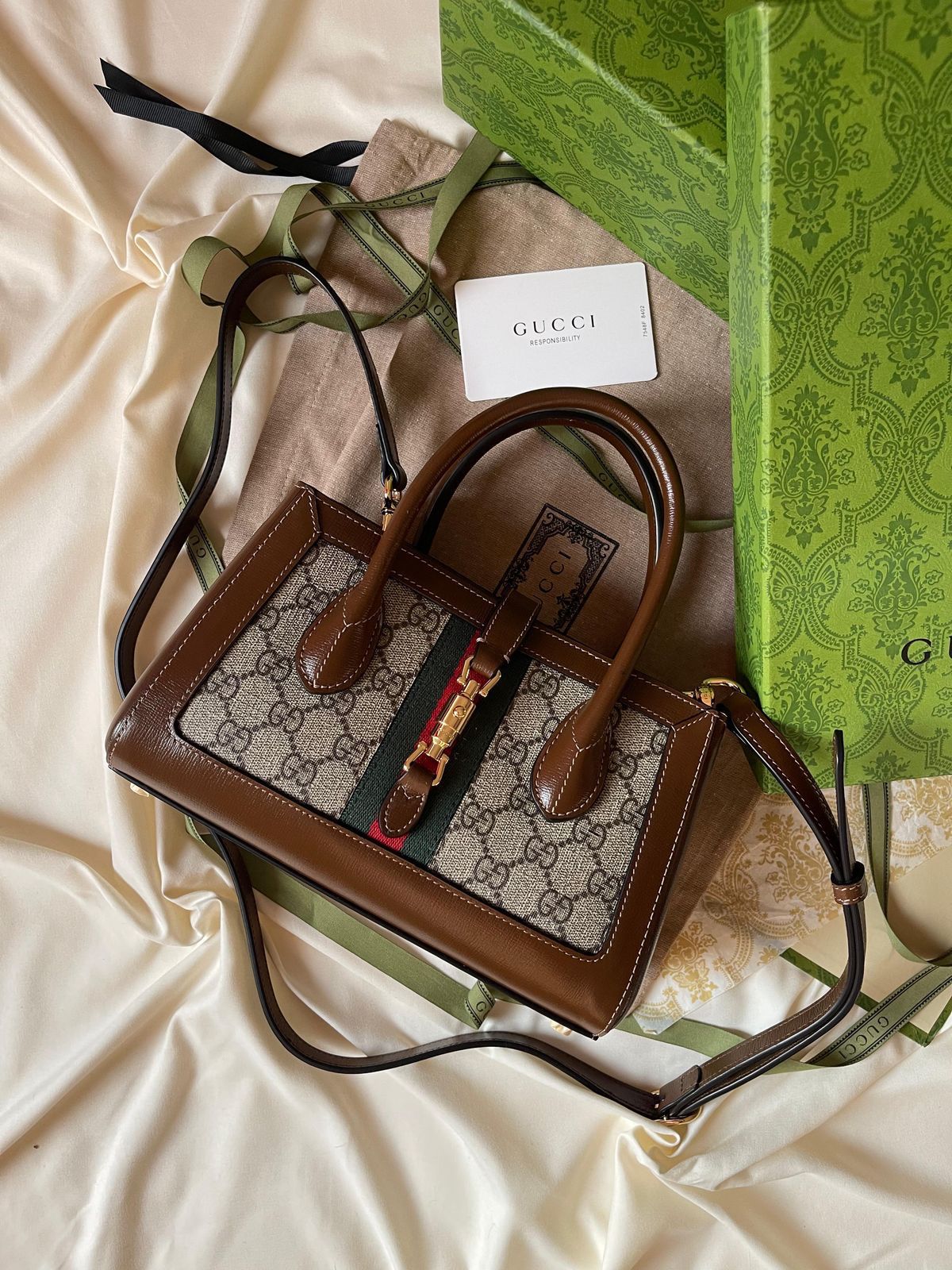 Gucci GG Supreme Top Handle Bag with Detachable Shoulder Strap