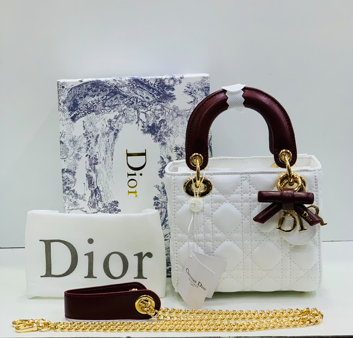 Cannage Quilted Mini Handbag with White Bow Charm